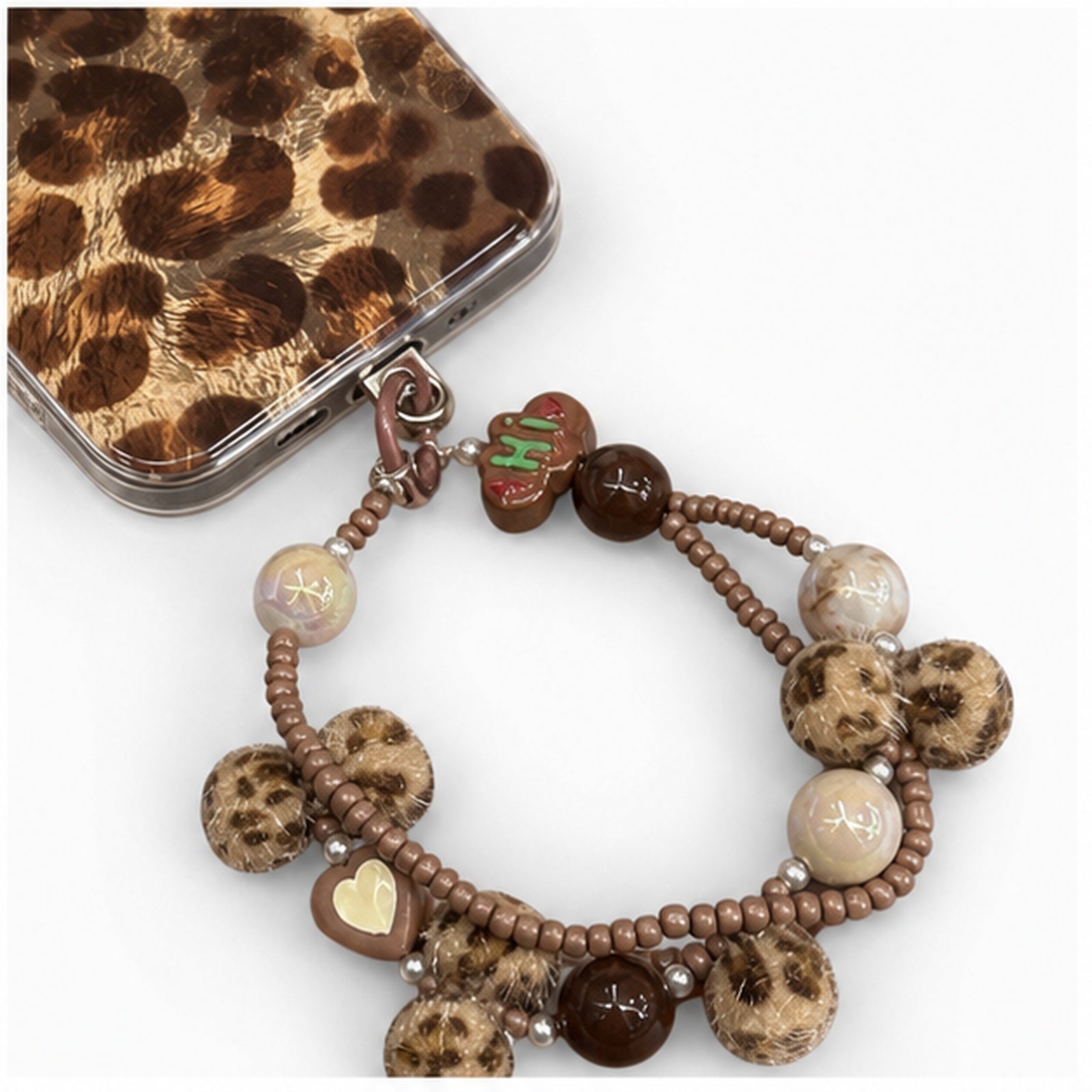 Retro Leopard Charm Strap Case for iPhone, close-up detail